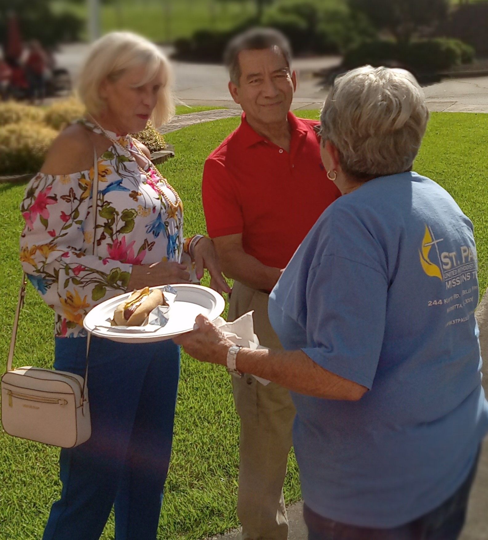 A woman in a blue shirt with the word star on it