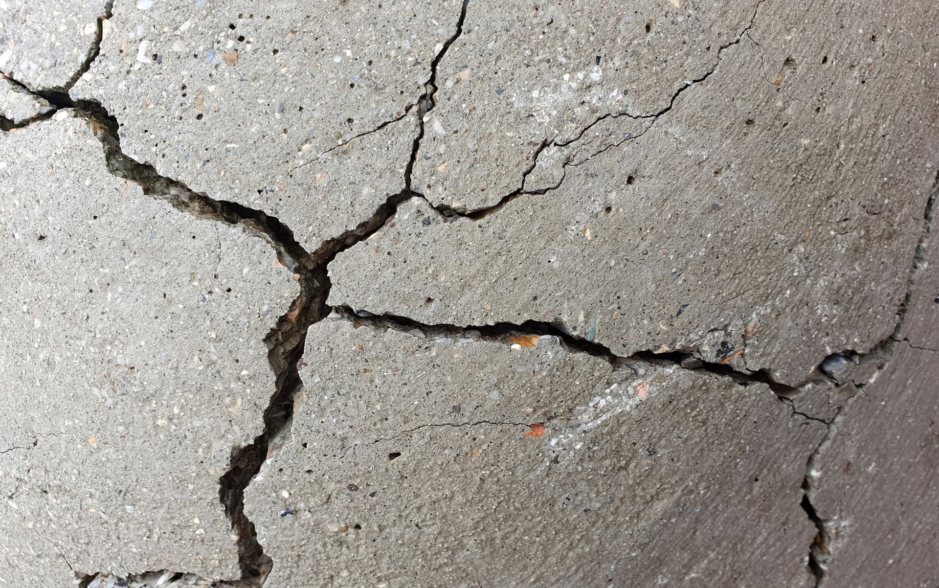 Detail of cracked concrete surface.