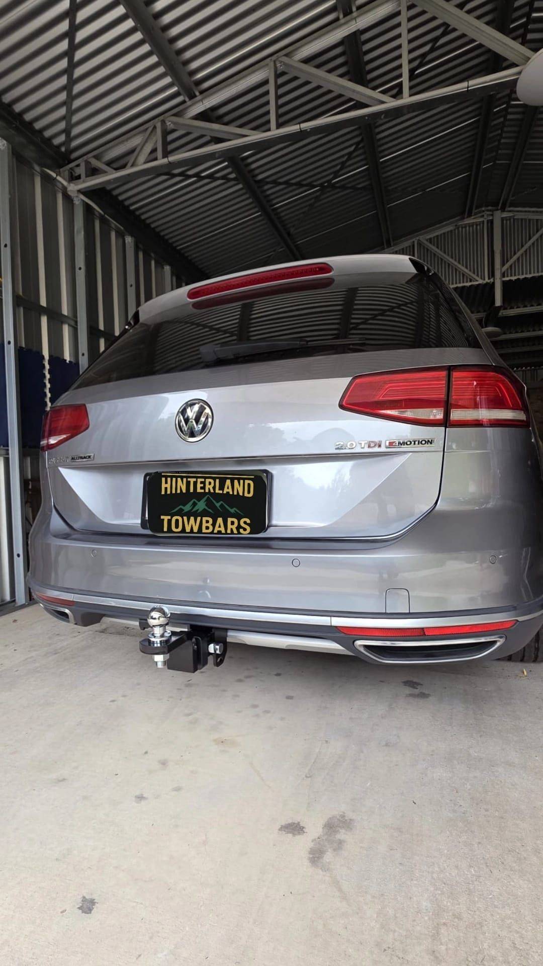 Trailer Hitch Installed on the Rear of a Black Vehicle — Hinterland Towbar & Steel Fabrication In Southside, QLD