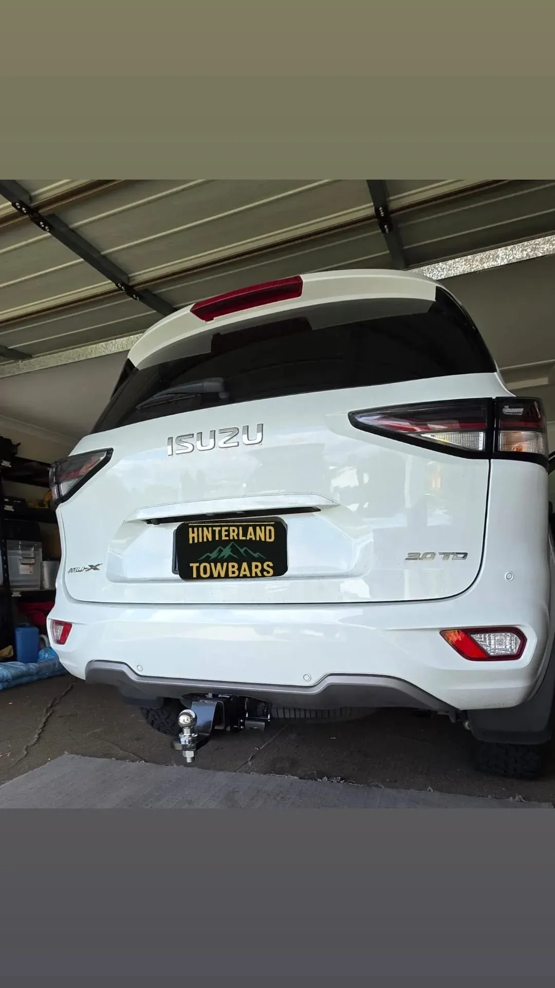 White Isuzu Mu-x Suv From Rear, Parked Under a Shelter — Hinterland Towbars in Yandina, QLD