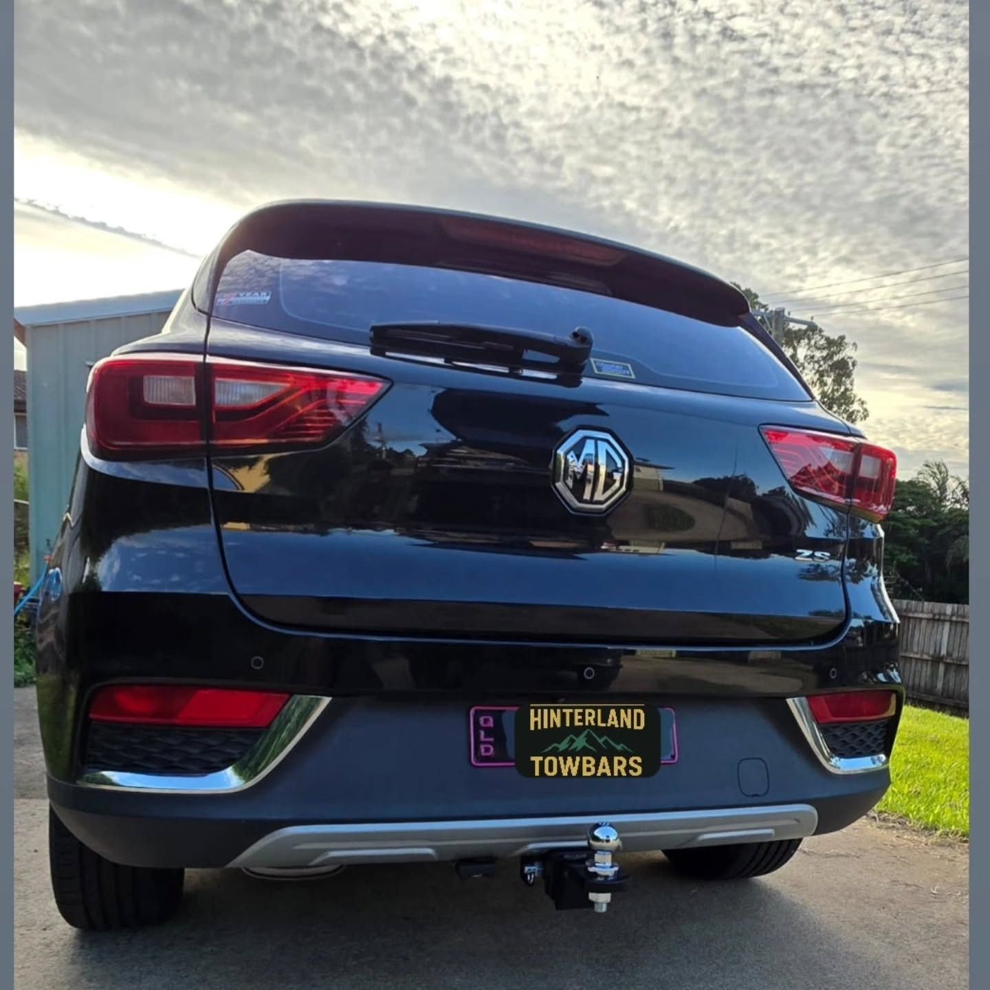Close-up of a Trailer Hitch Attached to the Back of a Vehicle — Hinterland Towbar & Steel Fabrication In Southside, QLD