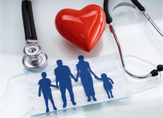 Red heart, stethoscope, and family silhouette on surgical mask, symbolizing healthcare and family.