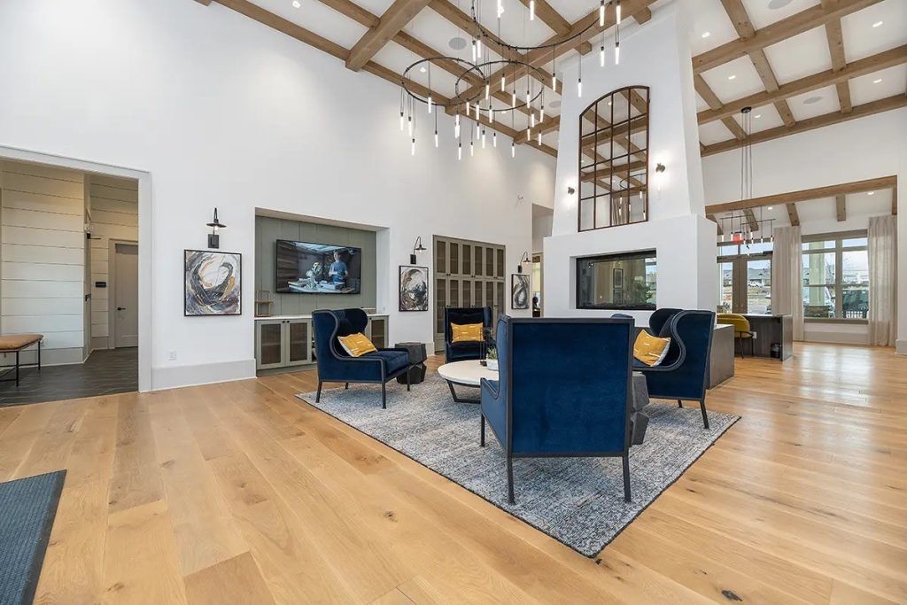 A living room filled with furniture and a television.