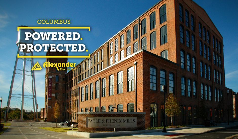 A large brick building with a sign that says columbus powered protected