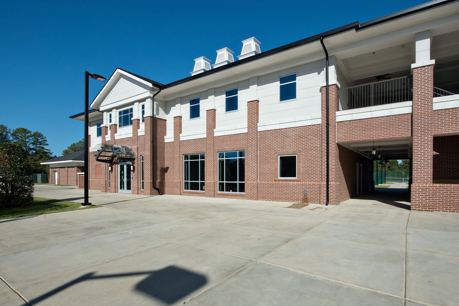 A large brick building with a lot of windows