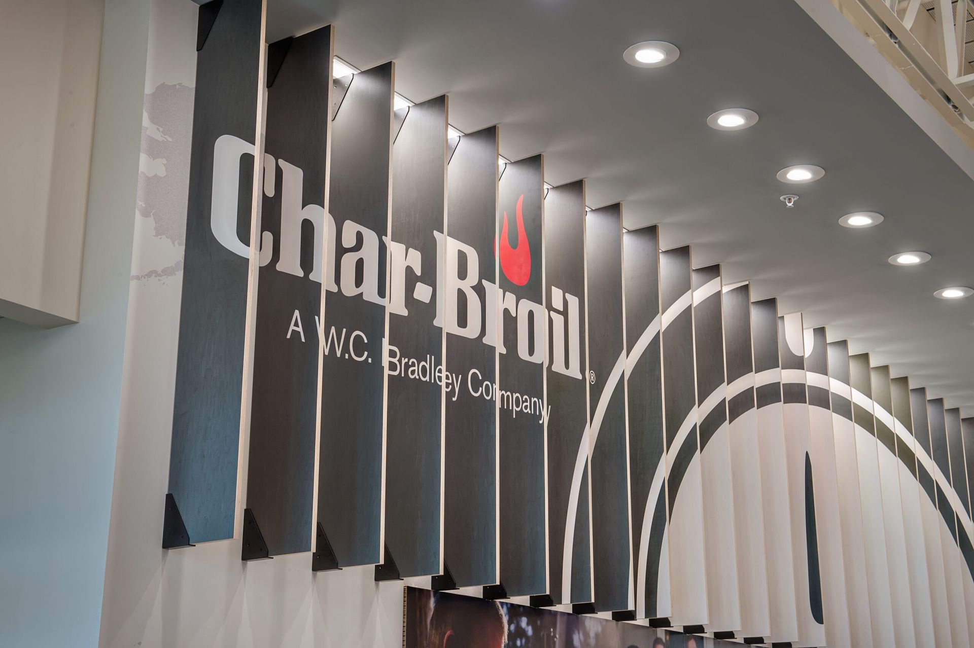 A wall with a sign that says char broil on it