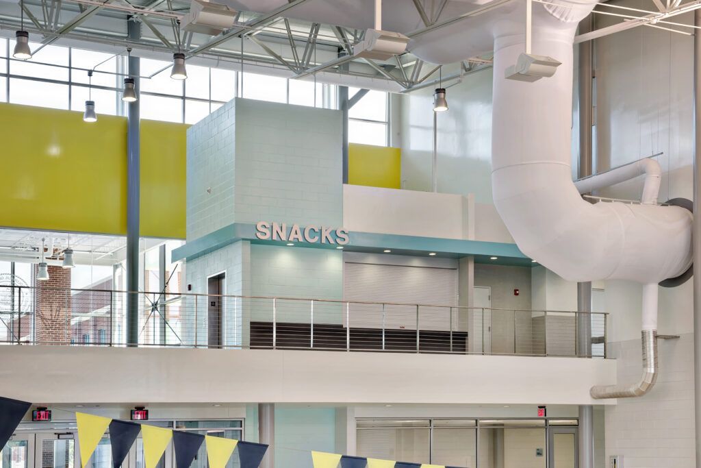 A building with a sign that says snacks on it