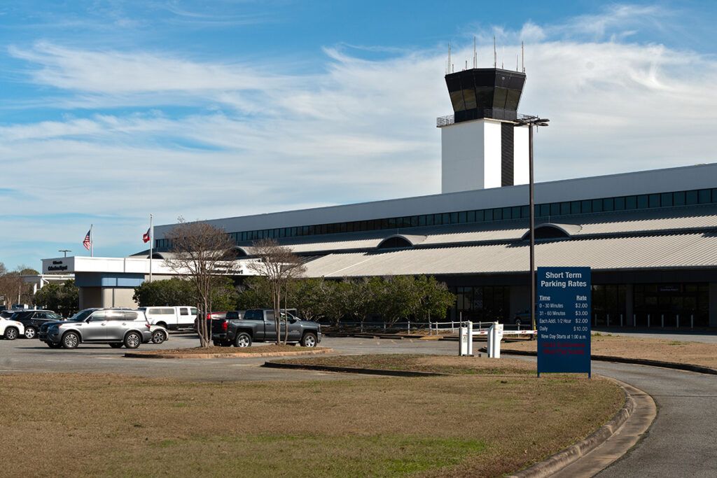 A large white building with a tower on top of it