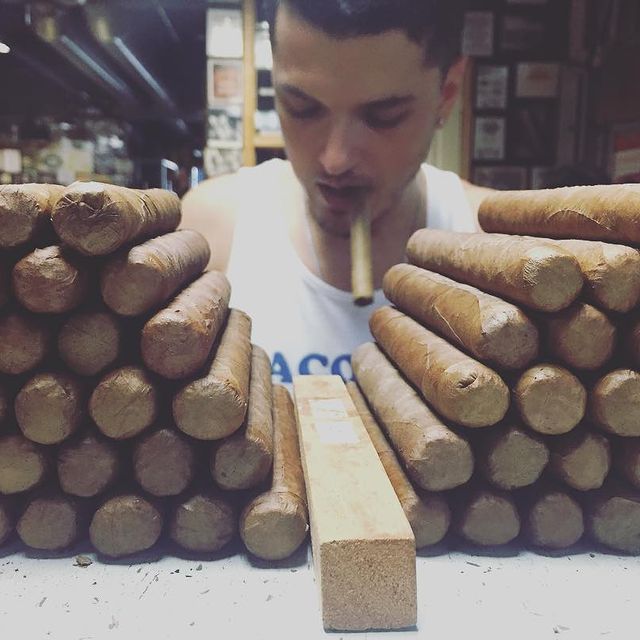 Kris Miller Rolling cigars