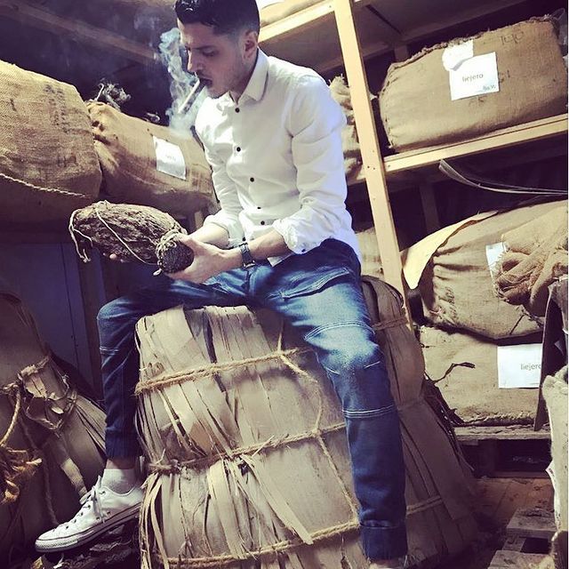Kris Miller holding tobacco