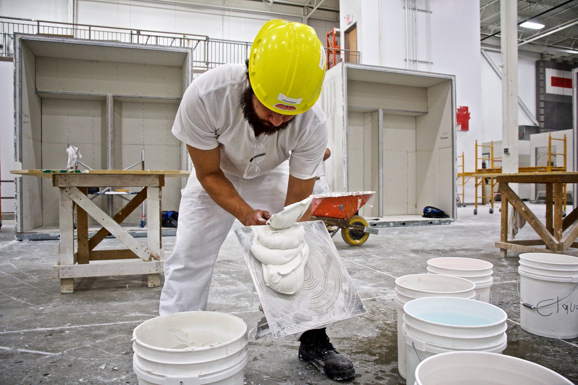 Photo of man mixing plaster