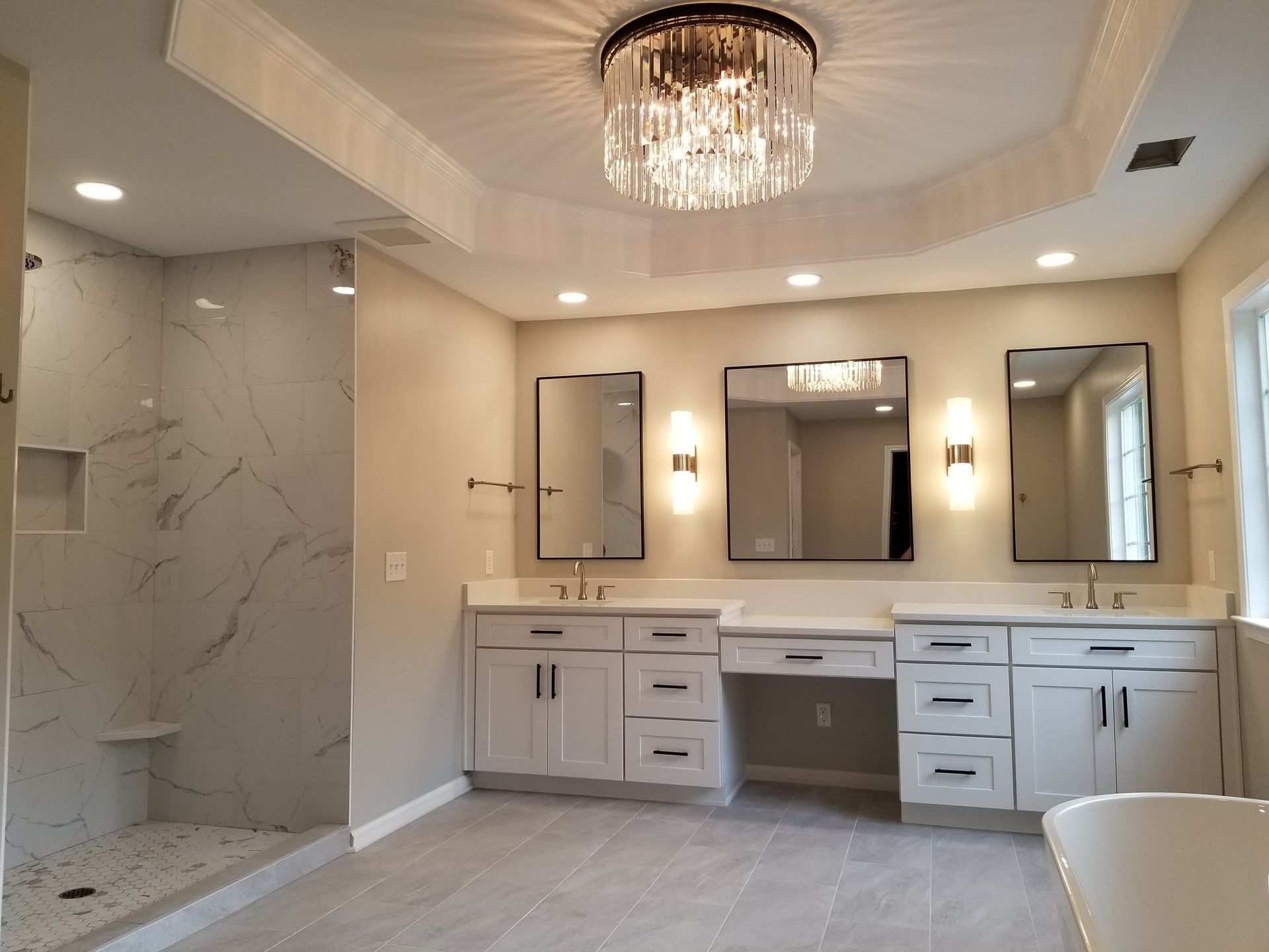 A bathroom with a bathtub toilet and sink