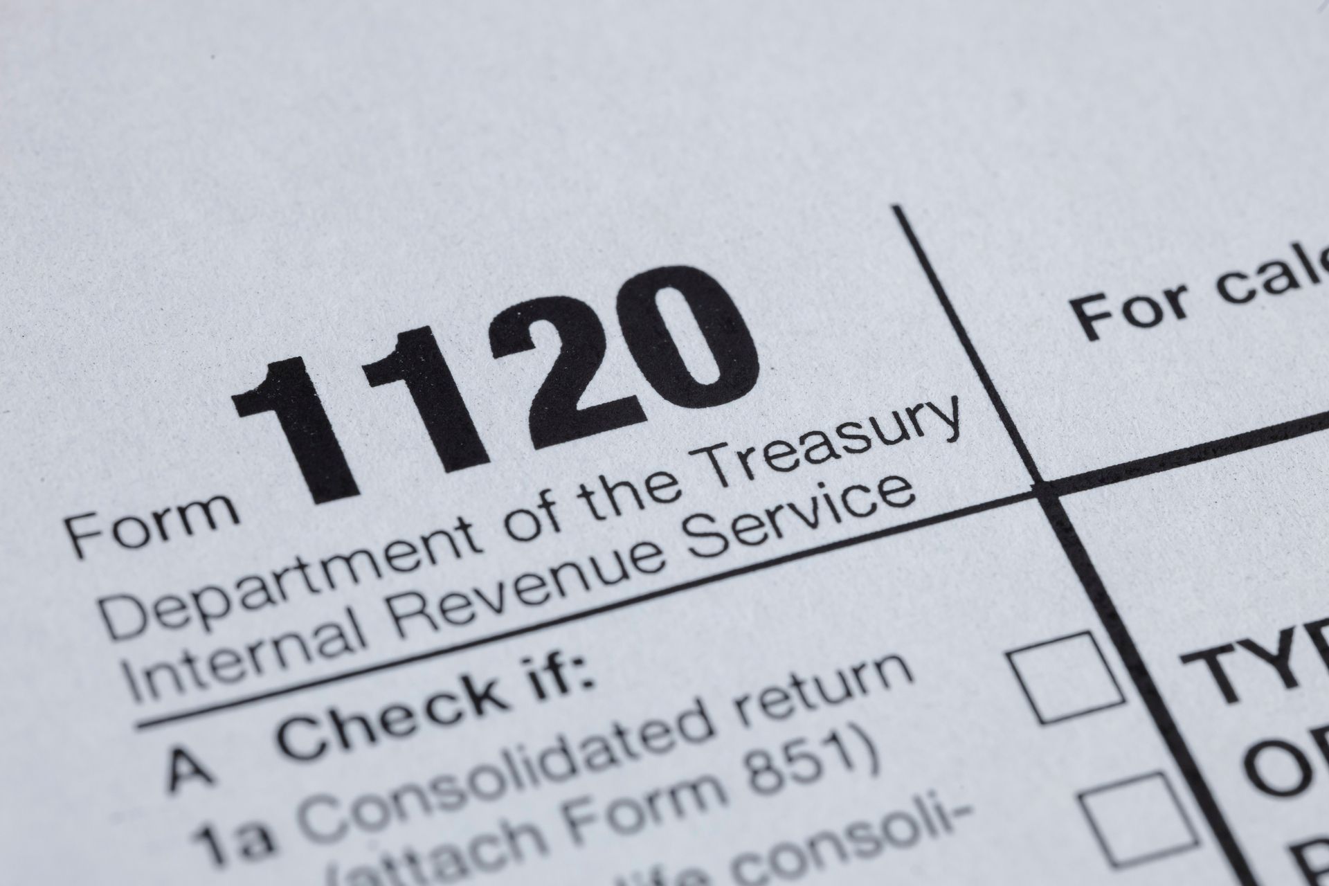 Close-up of a U.S. Corporate Income Tax Return form (Form 1120) with 