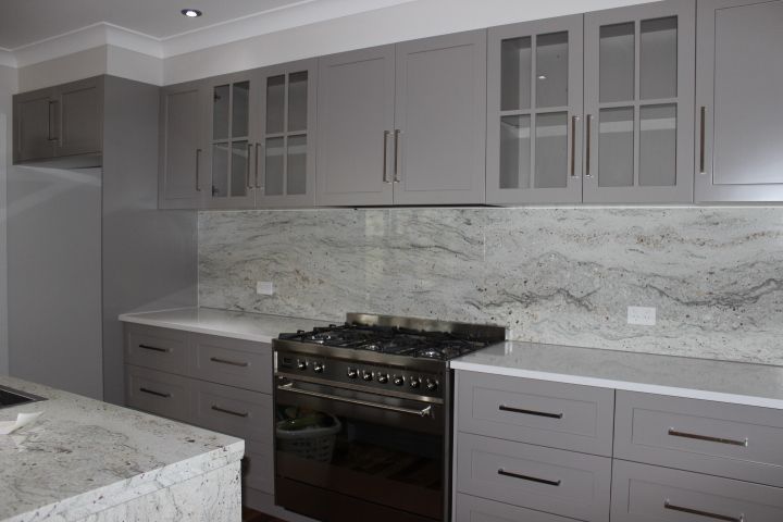 Modern Gray Kitchen with Marble Countertops, Glass-Front Cabinets — Simmonds Kitchens in Quirindi, NSW