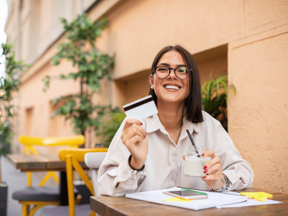 Woman Holding Credit Card