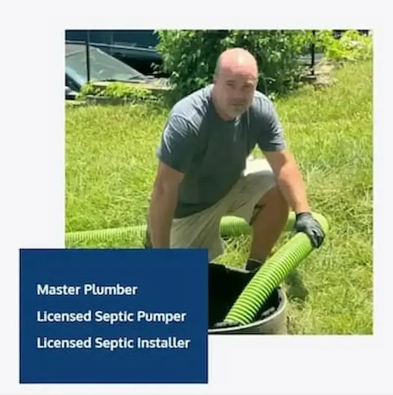 Man laying down to pipe Alabama Pumper Septic Tank Pumping near me - Man laying down to pipe