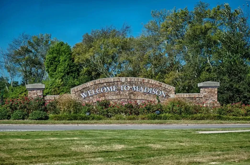 A sign that says rotary trail in the  Birmingham magic city
