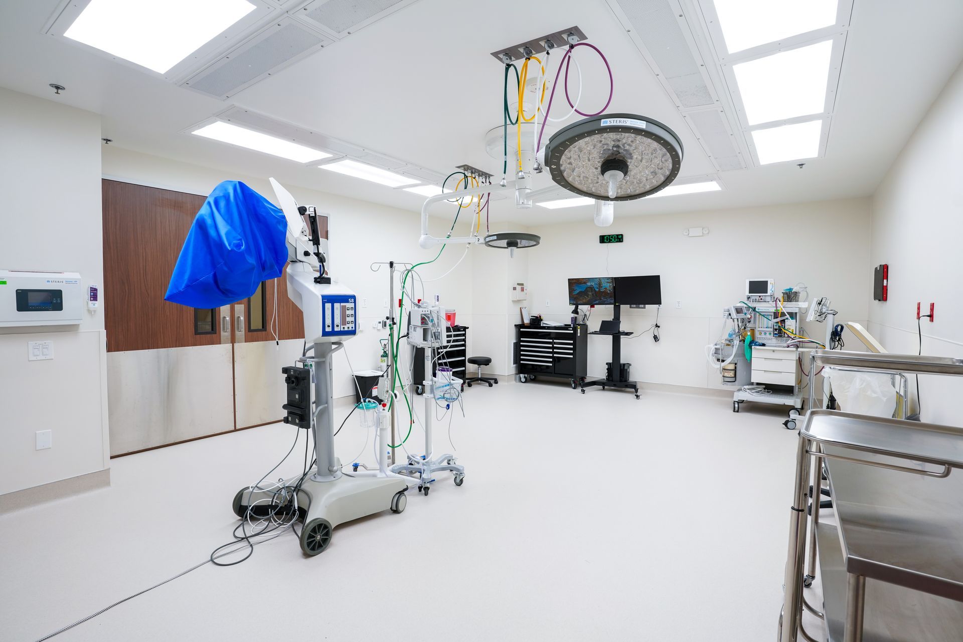 Lenza Surgical Center in San Antonio, Texas. An empty, bright operating room with medical equipment ready for use
