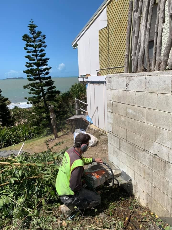 Person in Safety Gear Operating a Saw — Dondarra Concrete Cutting & Drilling in Parkhurst, QLD
