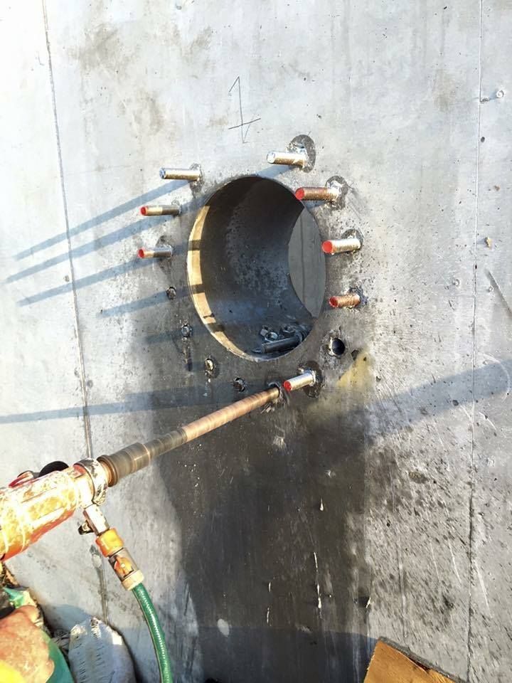 Concrete Wall With a Large Hole — Dondarra Concrete Cutting & Drilling in Parkhurst, QLD