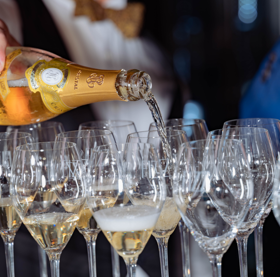 roederer cristal champagne being poured at an event in fizz walnut creek.