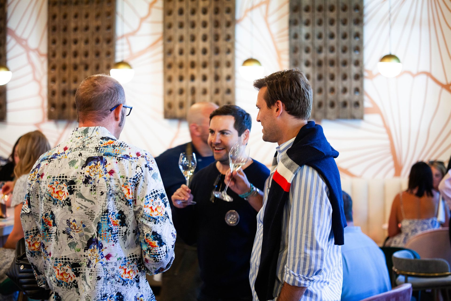 Gentlemen holding champagne glasses at fizz walnut creek.