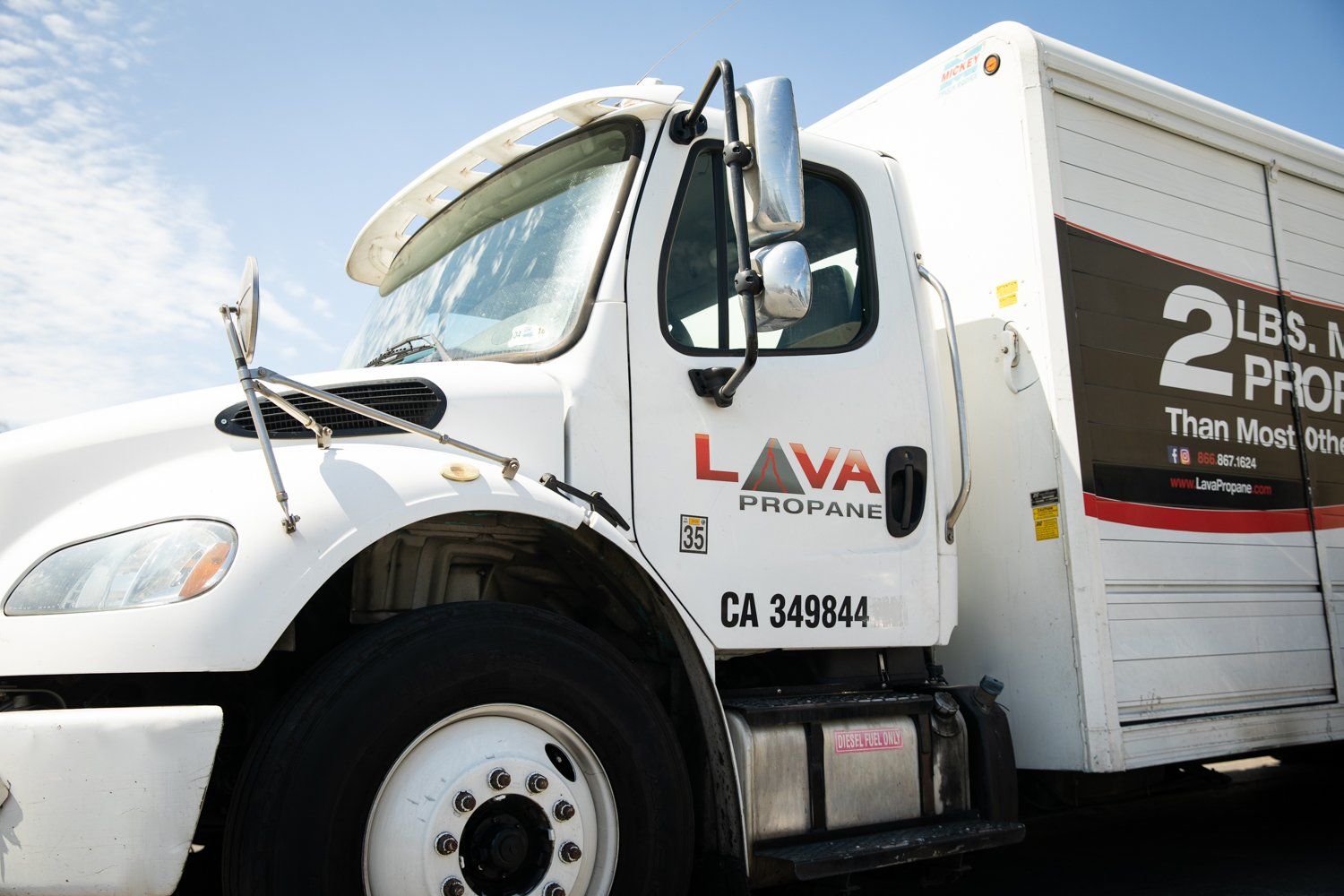 A white truck with the word lava on the side
