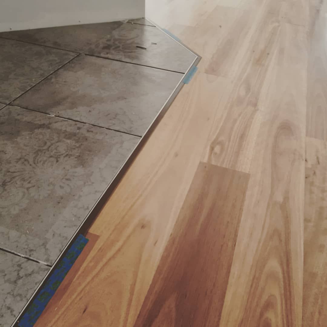 Tile floor meeting hardwood floor, transition strip. — The Good Wood Polished Timber Floors in Oakey, QLD
