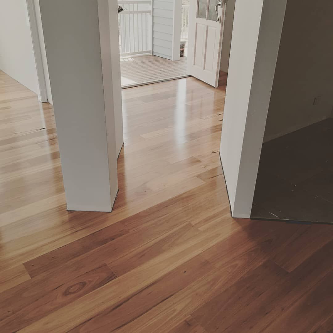 Wooden floor with view towards doorway and exterior. — The Good Wood Polished Timber Floors in Westbrook, QLD