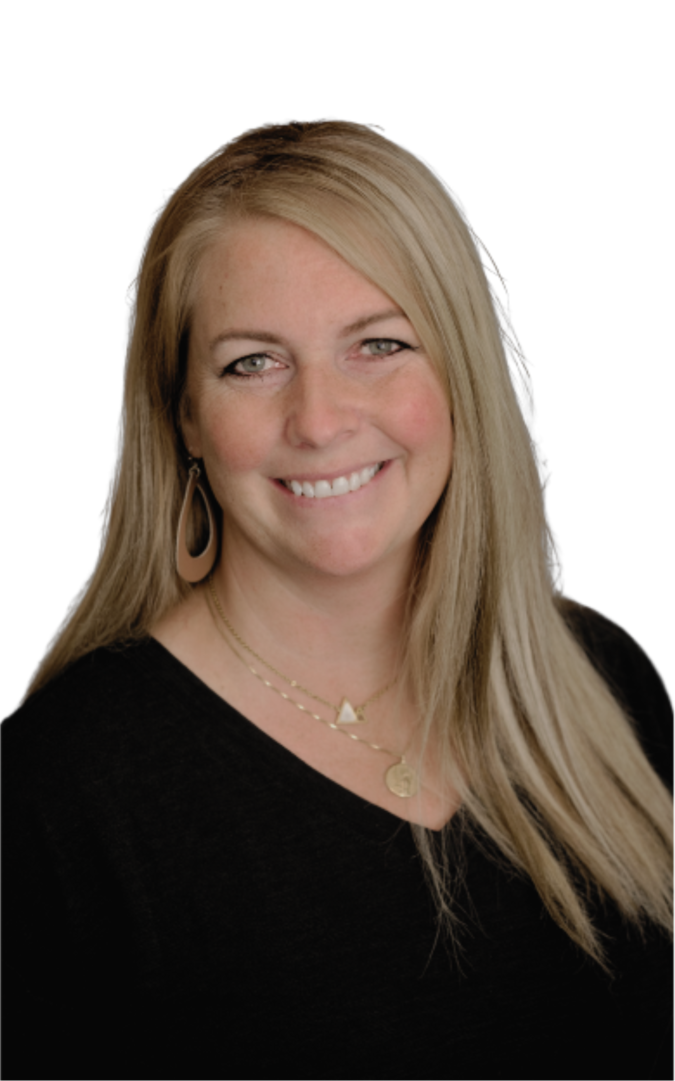 A woman with long blonde hair and a black top smiles at the camera against a white background.
