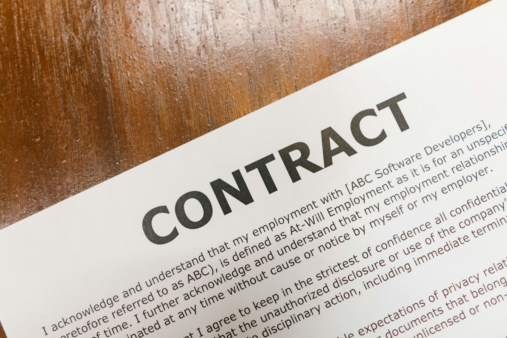 A close-up of a contract titled 