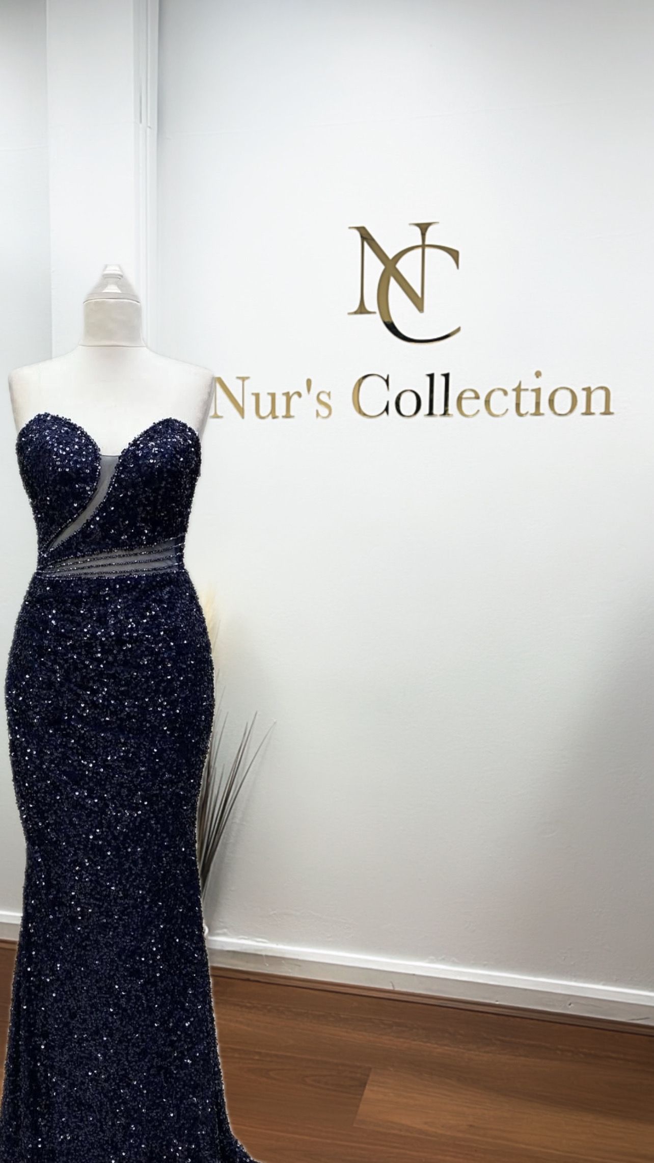 A Woman Is Wearing A Black Dress With A High Slit — Nur's Collection In Rockdale, NSW
