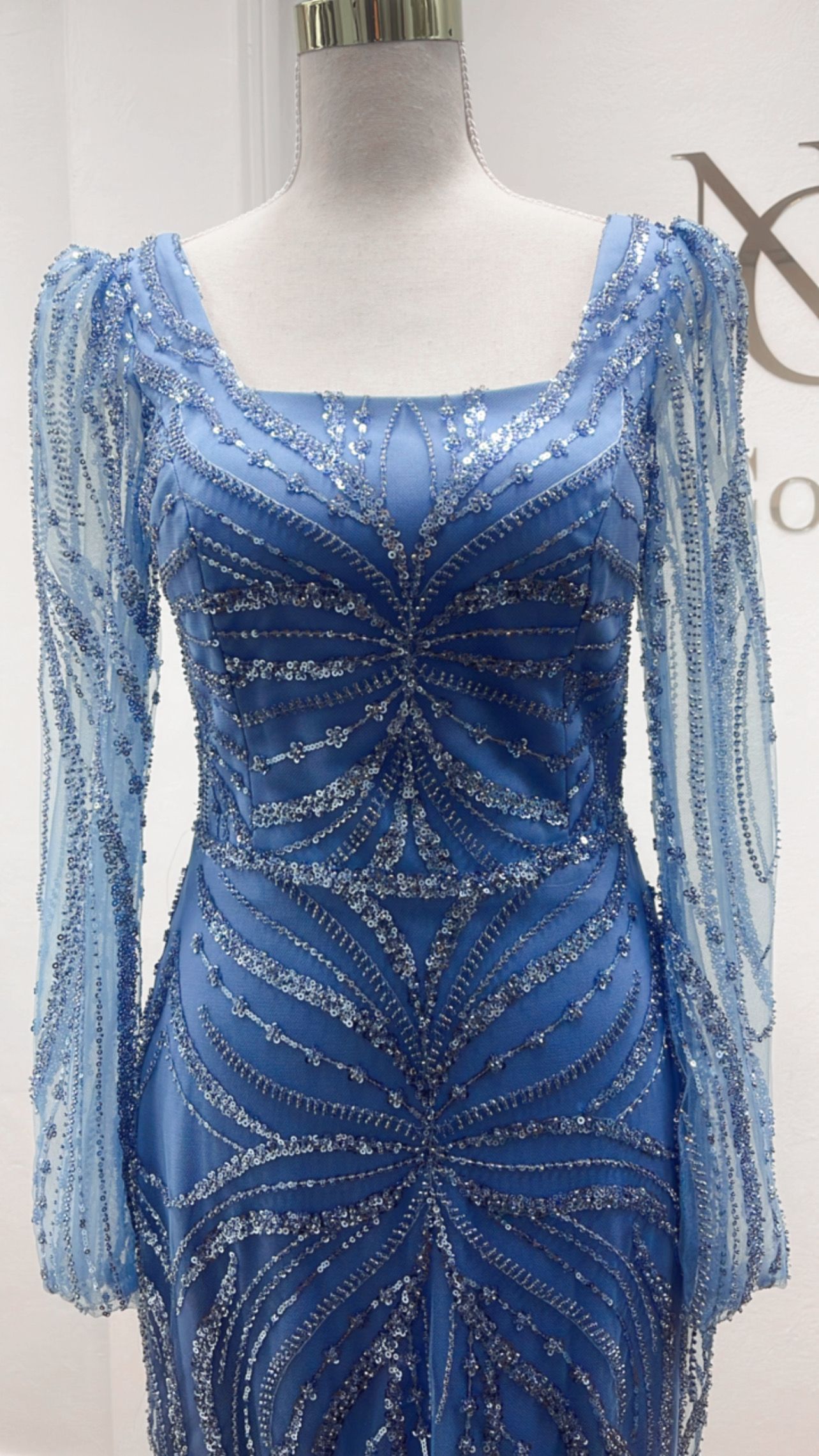 A Woman in A Long Red Dress Is Standing in Front of A Mirror — Nur's Collection In Rockdale, NSW