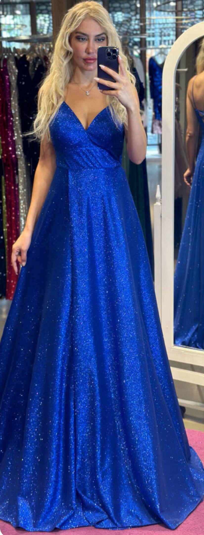 A Woman Is Standing in Front of A Mirror Wearing a Blue Dress — Nur's Collection In Rockdale, NSW