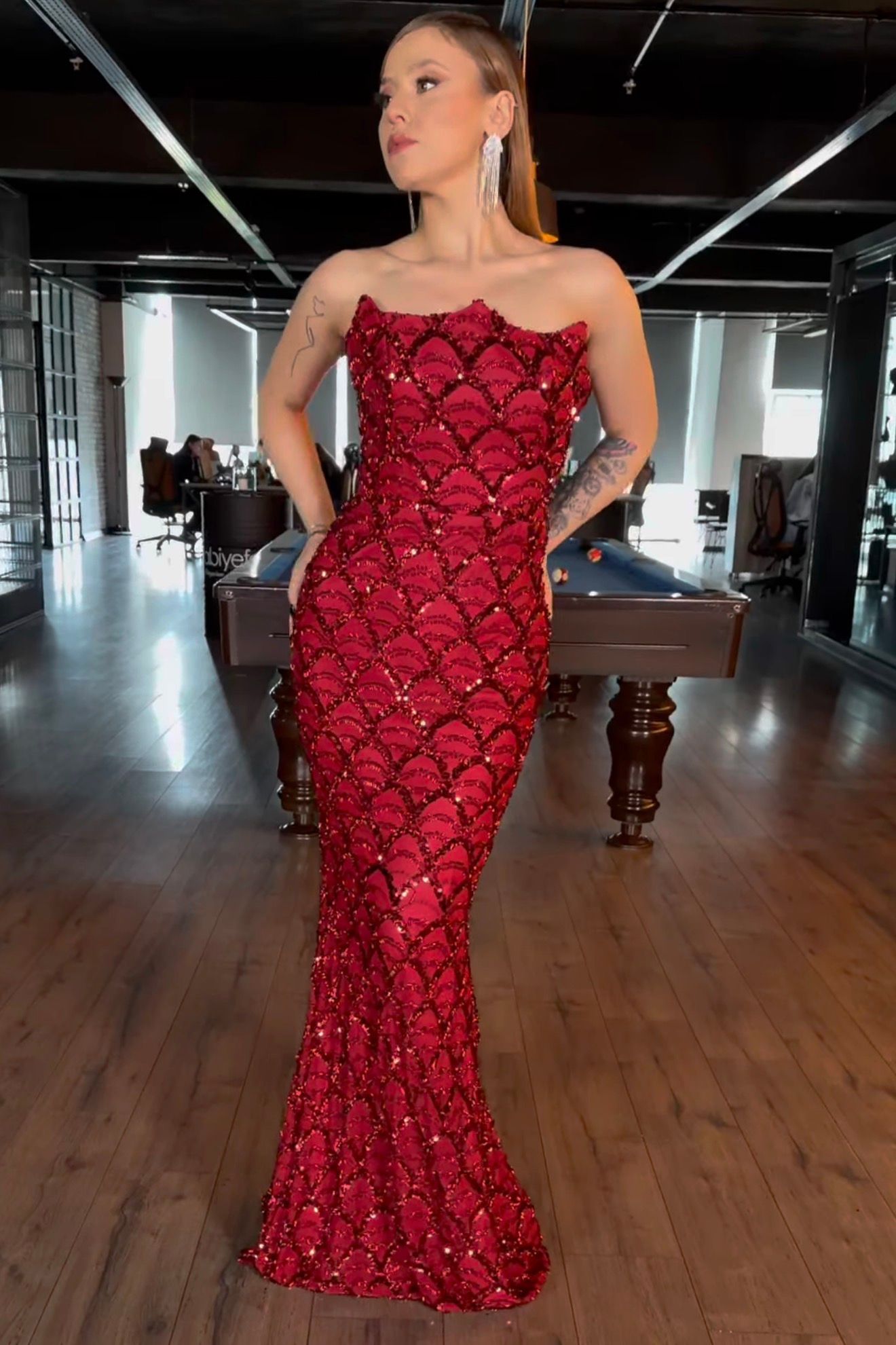 Woman in a Red Sequined Strapless Gown Standing in a Room — Nur's Collection In Rockdale, NSW