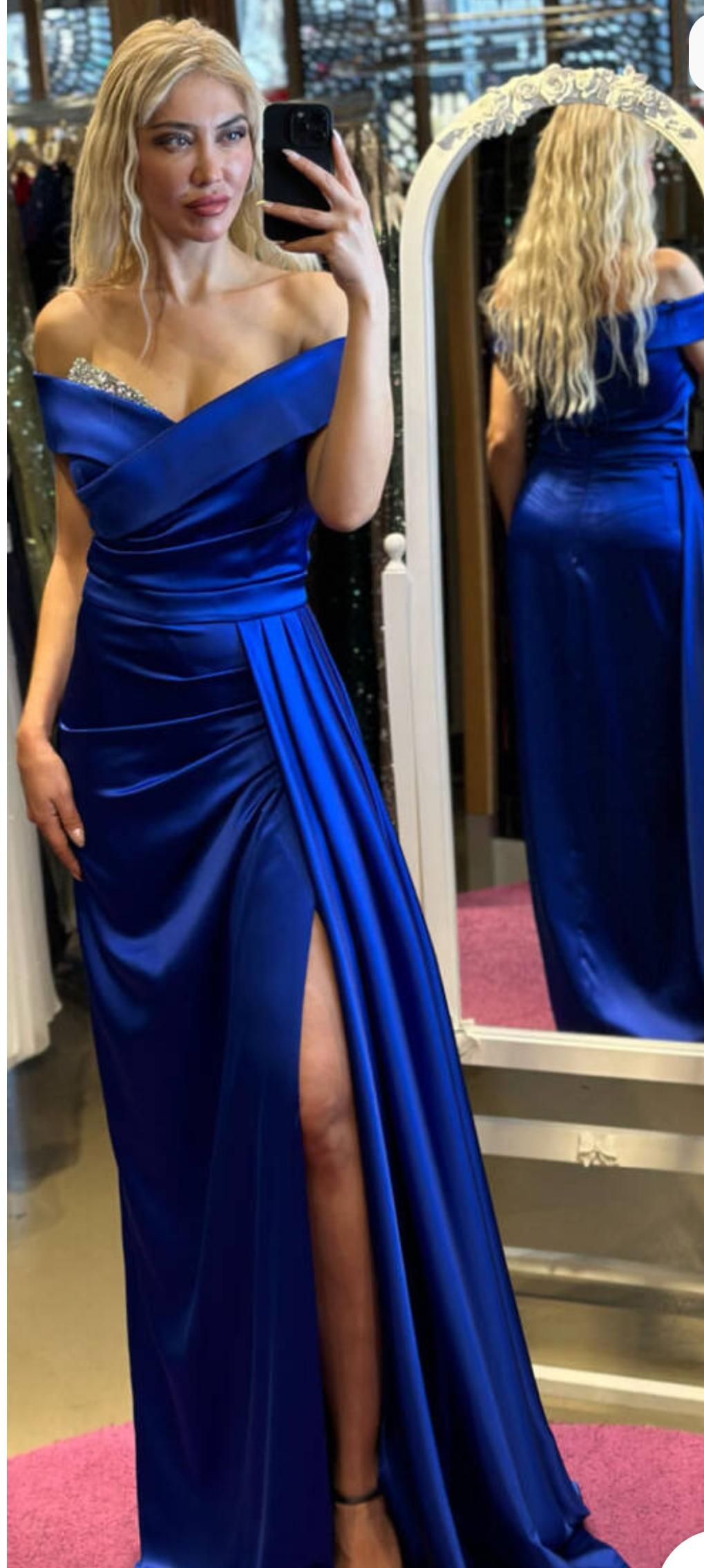 A Woman in a Blue Dress is Taking a Selfie in Front of a Mirror β Nur's Collection In Rockdale, NSW