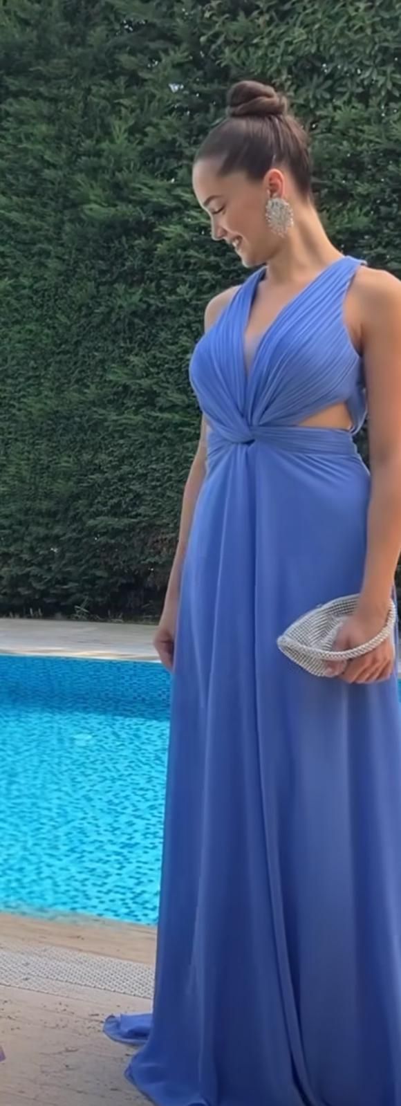 A Woman in a Blue Dress is Standing Next to a Pool β Nur's Collection In Rockdale, NSW