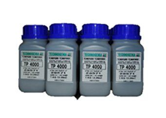 Four bottles of tp 4000 toner are lined up in a row on a white background.