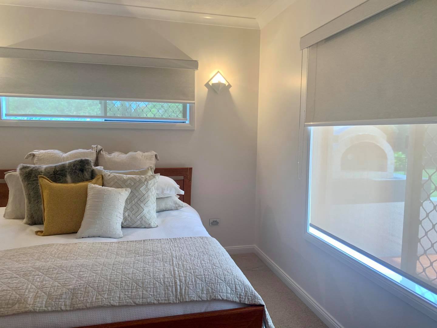 Roller Blind in Bedroom — Window Coverings in Currajong, QLD