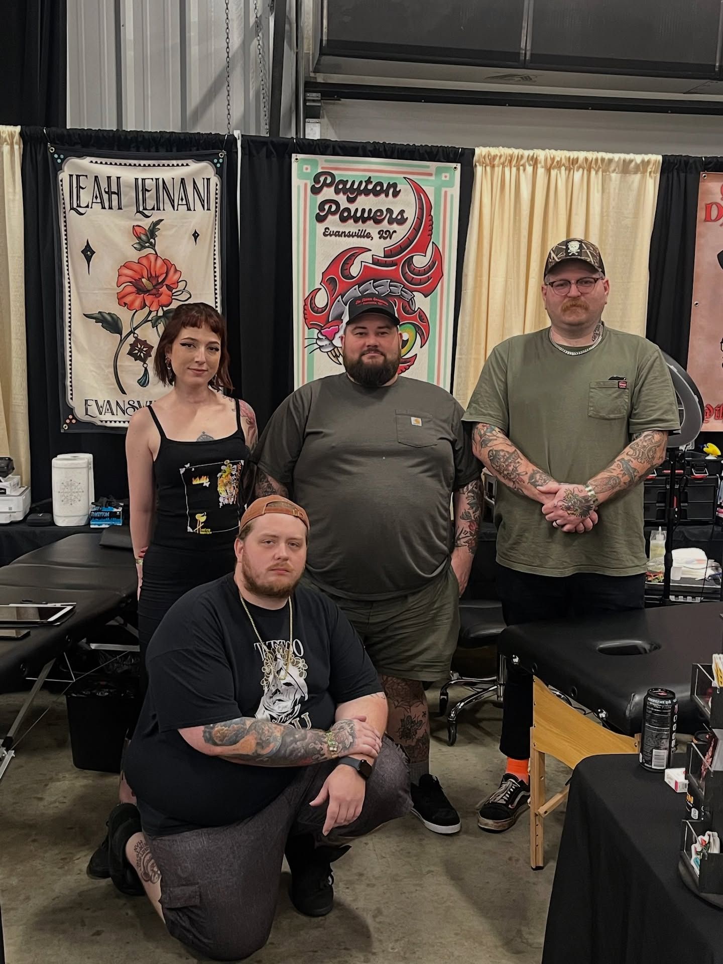 Person receiving microblading on their eyebrow by someone wearing black gloves.