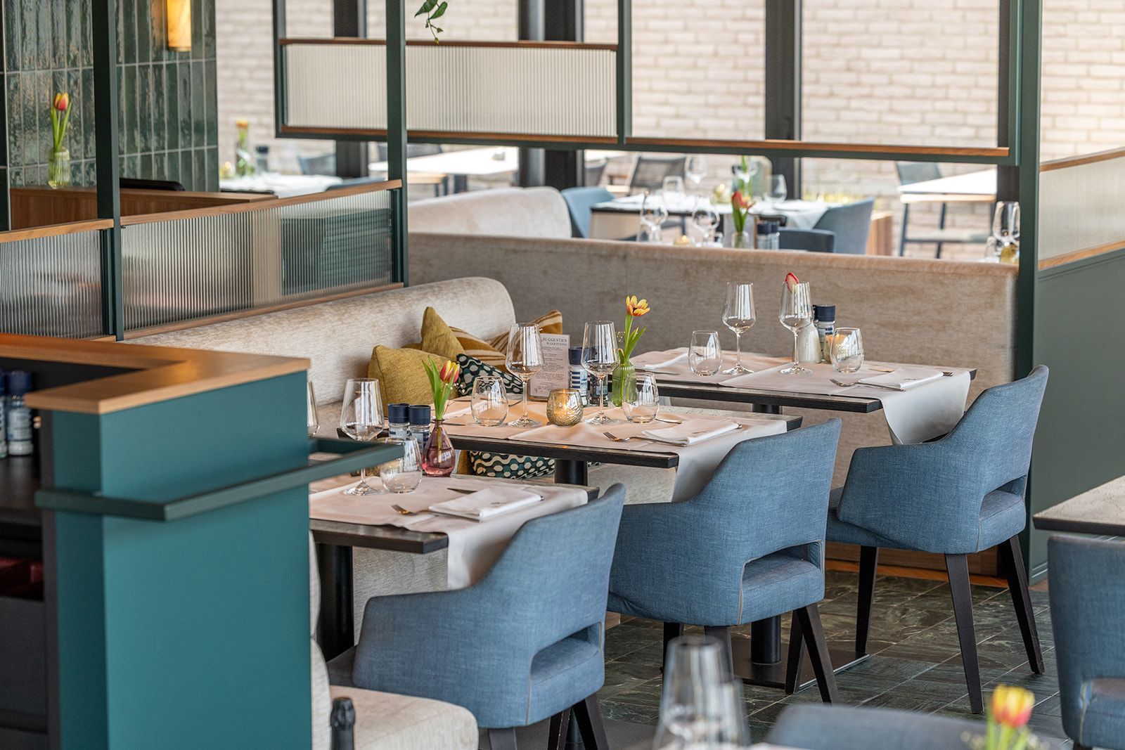 Fresh, raw scallops in their shells resting on a bed of crushed ice.