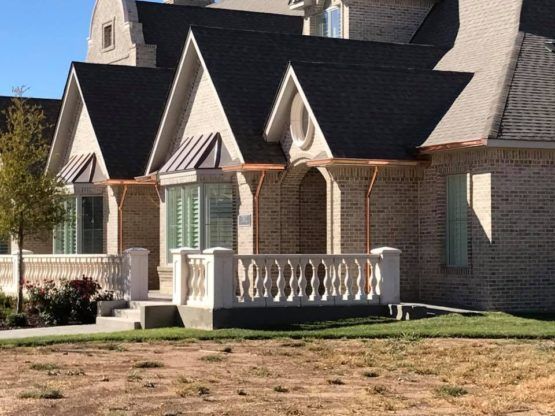 Copper Continuous Rain Gutters and Down Spouts