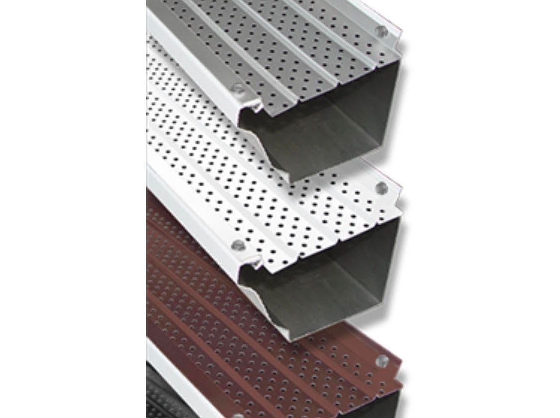 Three stacked rain gutter sections with perforated metal covers in silver, white, and brown.