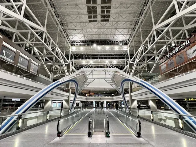 A large building with a lot of escalators in it
