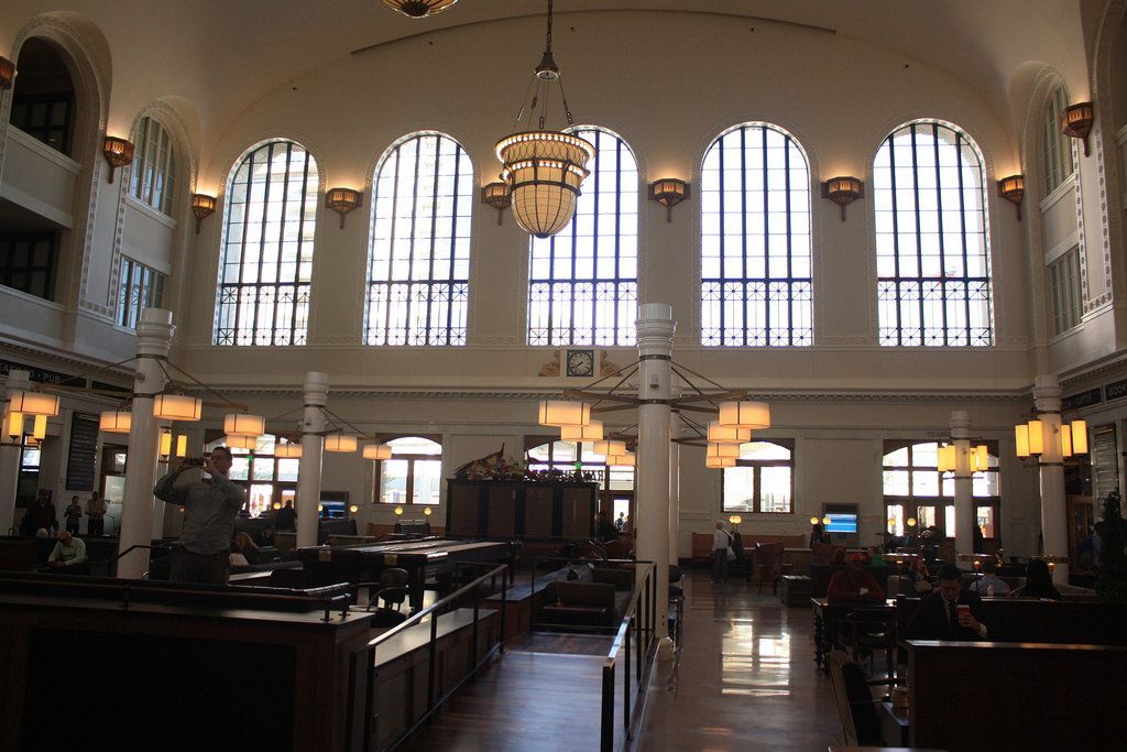A large building with a lot of windows and a chandelier