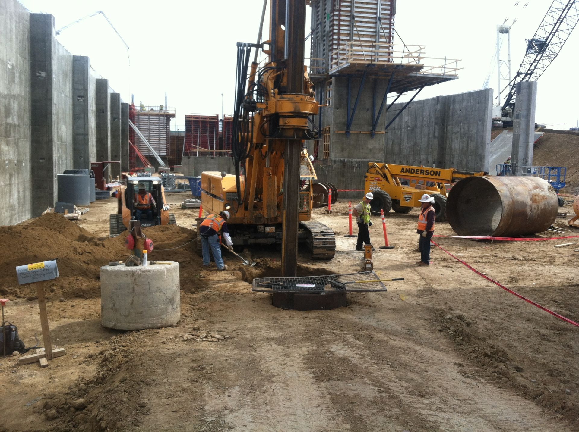 A group of construction workers are working on a construction site