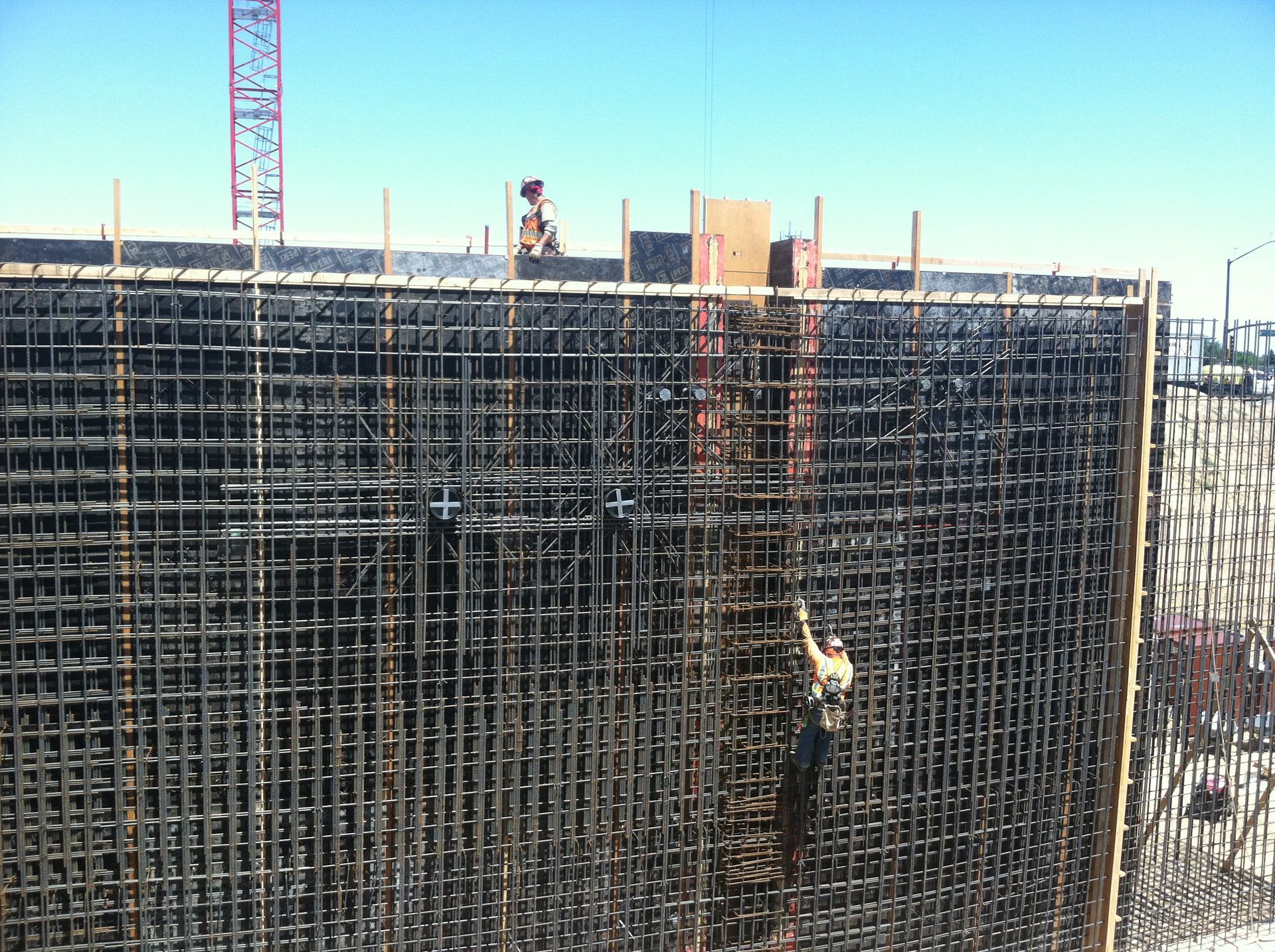 A construction site with a crane in the background