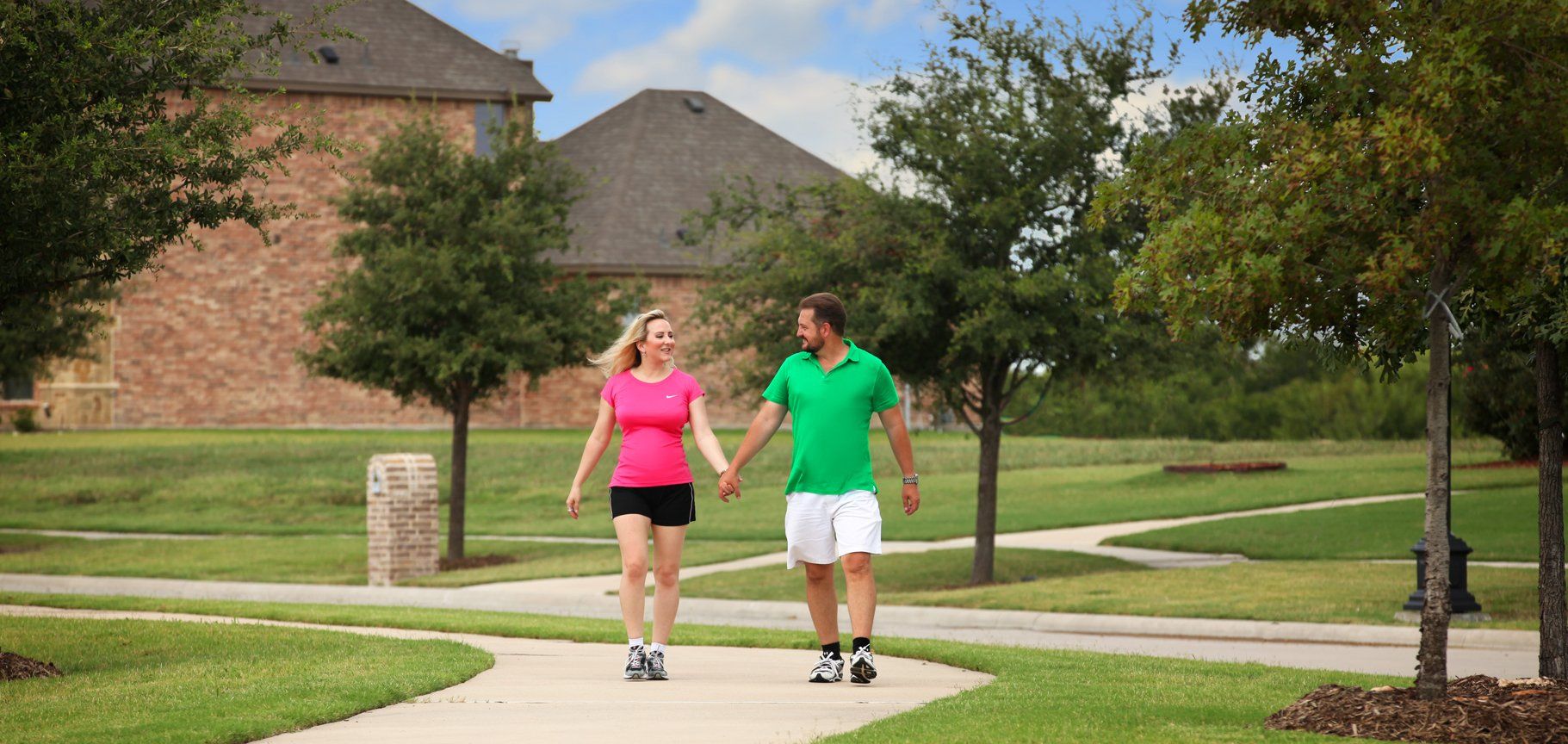 Couple Walking on Devonshire Community Path | Devonshire Living | Forney, TX 75126