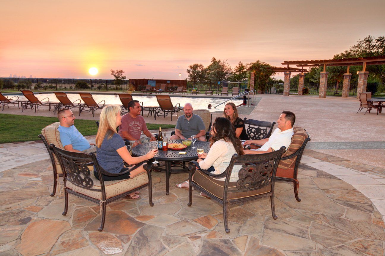 Friends Enjoying Community Clubhouse at Sunset | Devonshire Living | Forney, TX 75126