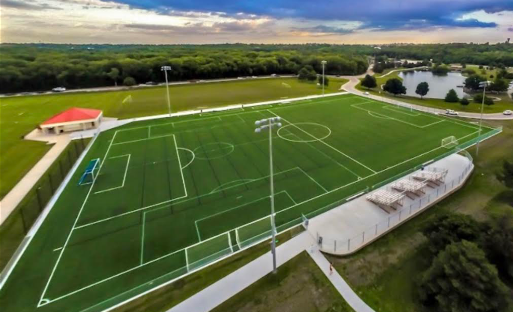 An aerial view of a soccer field in a park